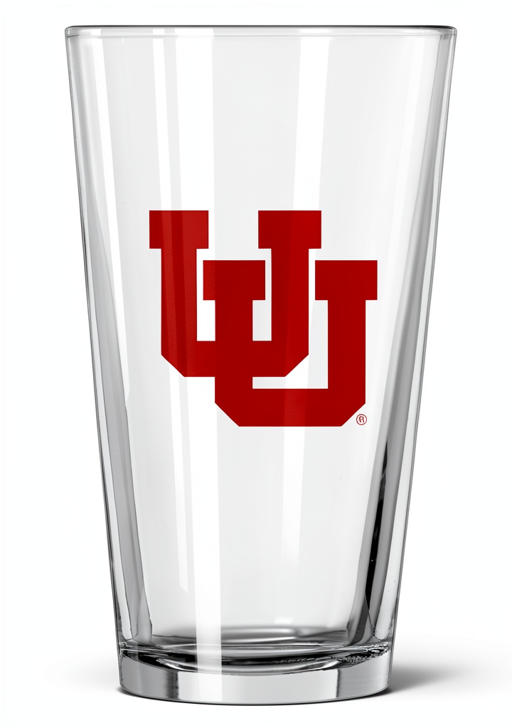 Logo Brands 16oz Gameday Pint Glass displayed on a tailgate table with cooler and snacks